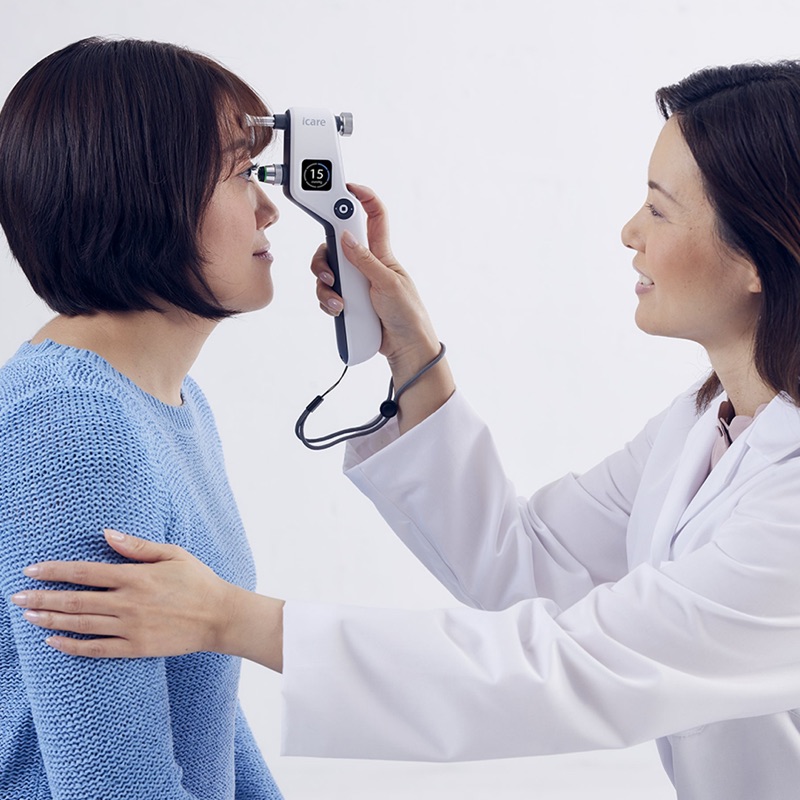 Doctor performing IOP measurement with IC100 tonometer